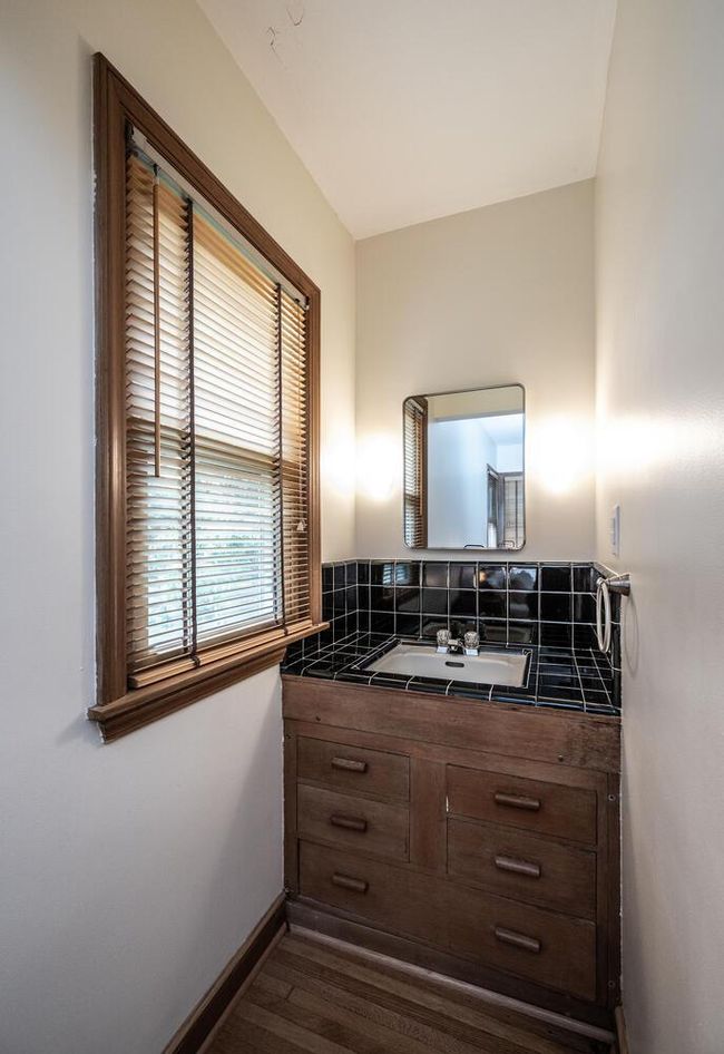 Owner's bedroom sink/cabinet | Image 15