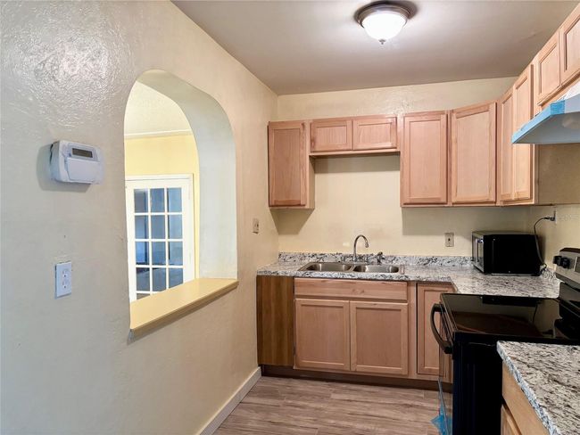 Kitchen Overlooking Dining | Image 5