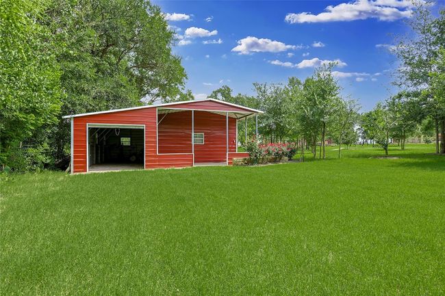 View of pole building with a lawn | Image 31