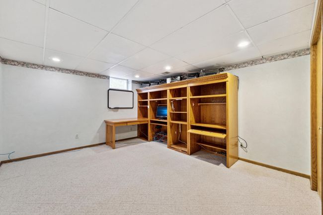 Lower level office/flex room with a large closet | Image 18