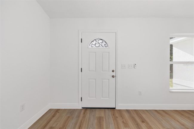 12974 Se 42 Nd Ct, House other with 3 bedrooms, 2 bathrooms and null parking in BELLEVIEW FL | Image 4