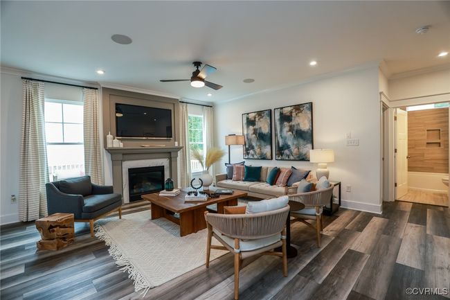 VIRTUAL STAGING. Photo represents the plan with virtual staging. Spacious and open family room. | Image 11