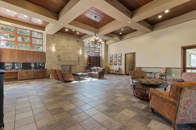 Lobby featuring a towering ceiling, beam ceiling, coffered ceiling, and recessed lighting | Image 26