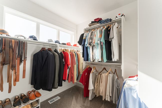 Walk in closet with carpet and visible vents | Image 12