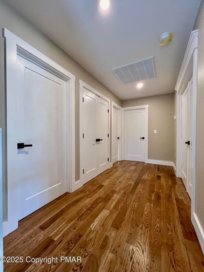 Upstairs Hallway w/ Closet | Image 22