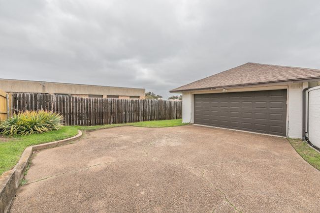 Unit of 4904 View of 2 car garage and private driveway | Image 39