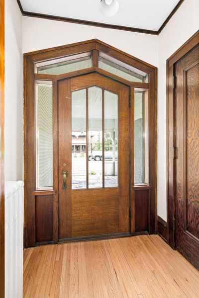 Beautiful front Entry with original woodwork, includes a large closet | Image 2