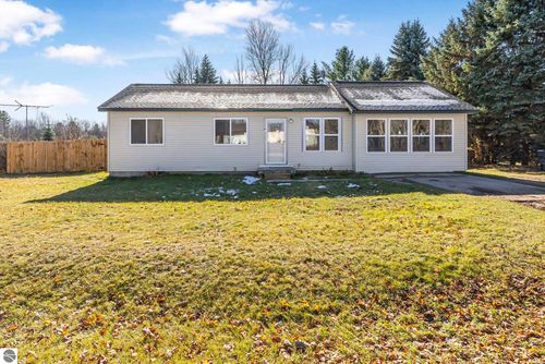 7423 Scotchwood Lane, Grawn, MI, 49637 | Card Image