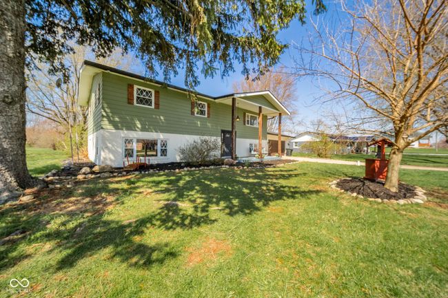 raised ranch with a front lawn | Image 40