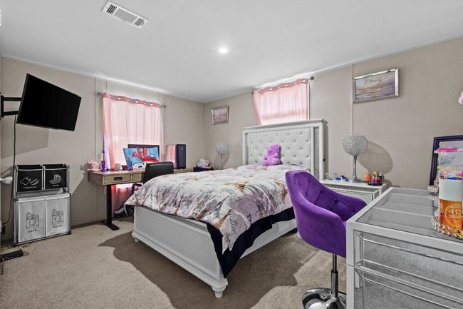 The centerpiece is a spacious 2, 061 sq ft manufactured home, just 1.5 years old, with 4 bedrooms, 2 bathrooms, and a beautifully crafted 40' x 20' stone outdoor kitchen under a covered roof with lighting—ideal for hosting under the stars. | Image 13