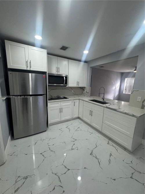 0-1171 Ne 161st Ter, North Miami Beach, FL, 33162-4511 | Card Image