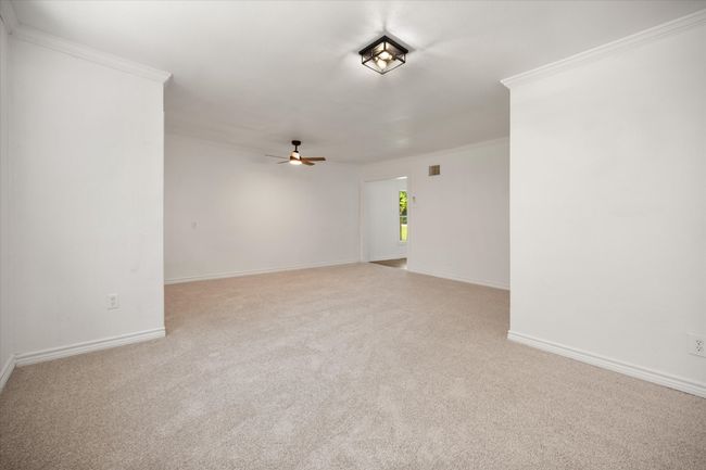flex room that can be used a secondary living area, playroom, office, or music room | Image 12