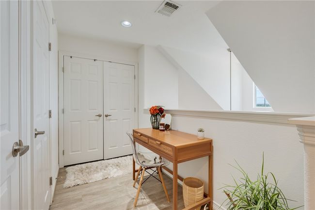Office featuring light wood finished floors and recessed lighting | Image 14