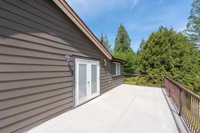 Balcony with french doors and a patio | Image 38