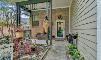 The welcoming front porch area is a great place for morning coffee or listening to the birds. | Image 3