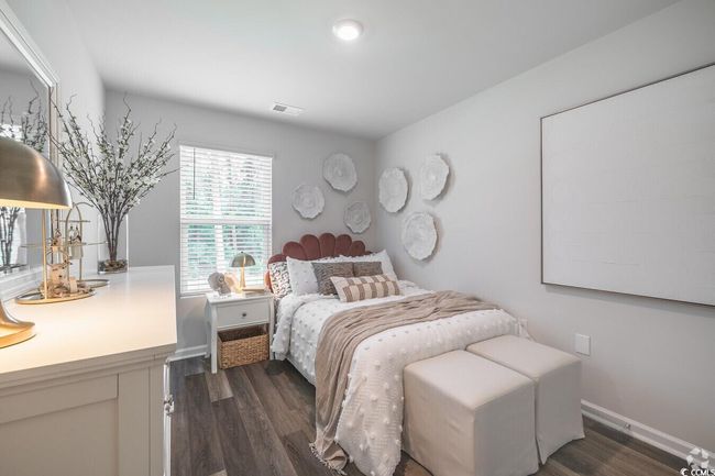 Bedroom featuring dark wood-style flooring | Image 11
