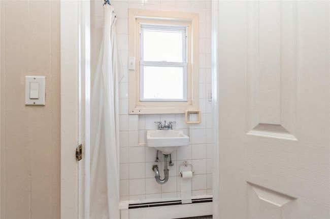 Second floor hall bath with shower. | Image 16