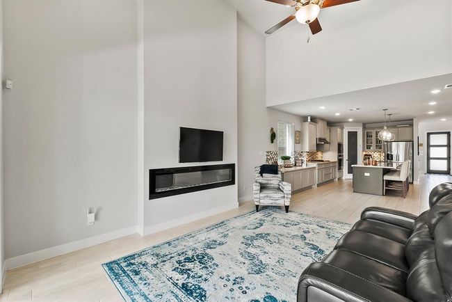 Inviting 84" linear fireplace | Image 13