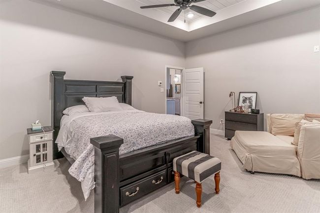 Office featuring a healthy amount of sunlight, french doors, ceiling fan, and light hardwood / wood-style flooring | Image 19