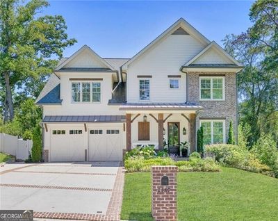 Picture perfect newer construction home with gorgeous landscaping and walk-out backyard | Image 1