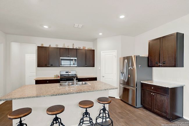 201 Legendary Trail Loop, House other with 5 bedrooms, 3 bathrooms and null parking in Floresville TX | Image 11