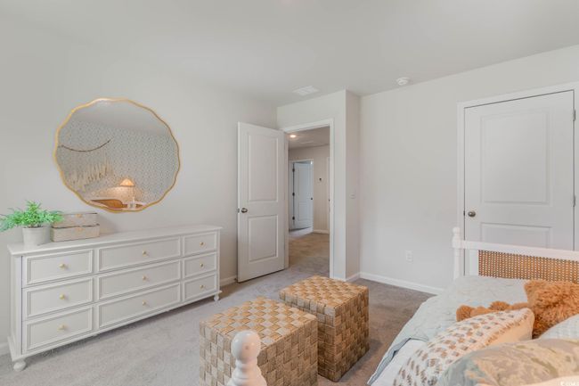 Bedroom with light carpet and baseboards | Image 22