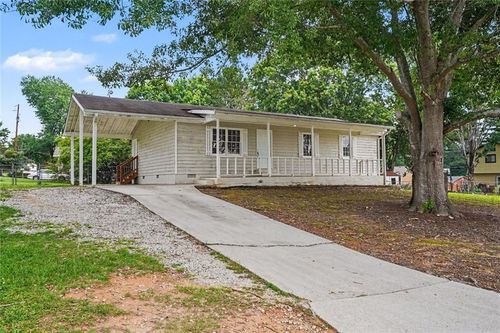 1394 Almand Creek Dr Sw, Conyers, GA, 30094-6206 | Card Image