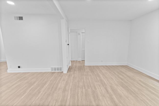 Unfurnished room featuring light wood-style floors, baseboards, and recessed lighting | Image 28