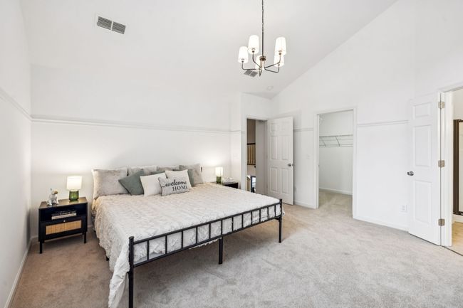 Primary Bedroom with Vaulted Ceiling and 2 Walk-in Closets | Image 34