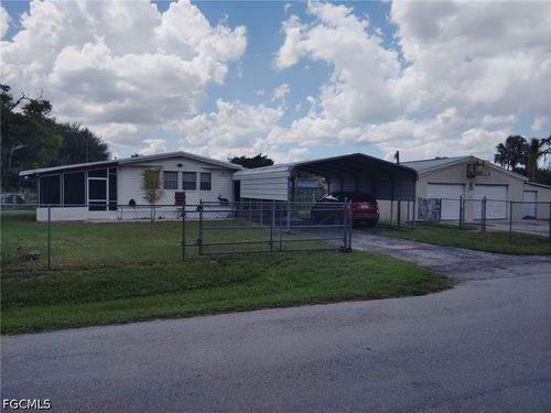 306 Pinecrest Ave, MOORE HAVEN, FL, 33471-3027 | Card Image