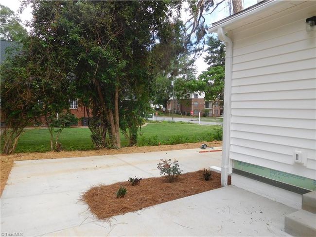 NEWLY POURED DRIVEWAY AND PATIO. | Image 27
