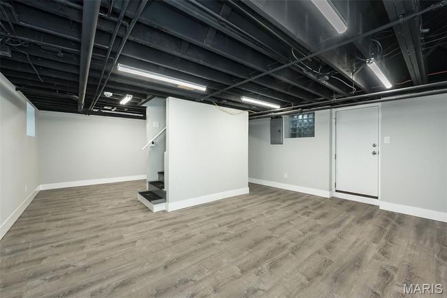Finished basement perfect for exercise area and toy room. | Image 27
