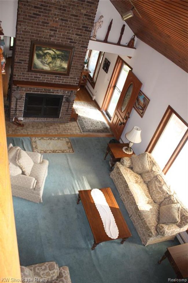 Looking down on the living room from the loft area. | Image 44