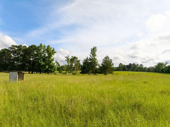 View of yard with a view of countryside | Image 14
