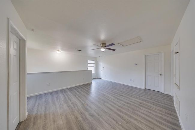 Game room located just upstairs, perfect for fun and relaxation. | Image 4