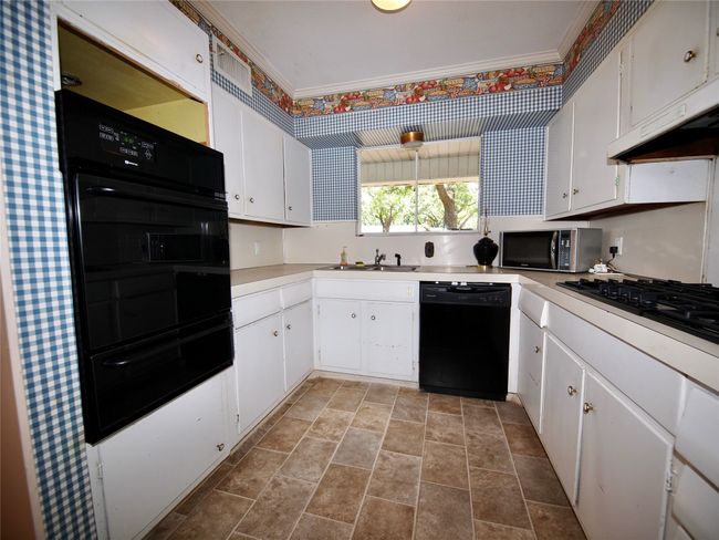 1431 Brazos St, House other with 4 bedrooms, 2 bathrooms and null parking in Graham TX | Image 9