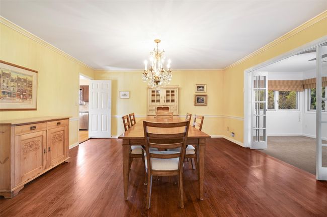Dining room open to sunroom | Image 13