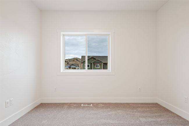 Carpeted spare room with baseboards | Image 16