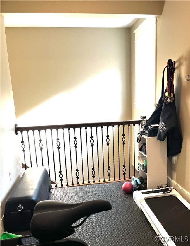 Exercise area looking out to the stairs | Image 35