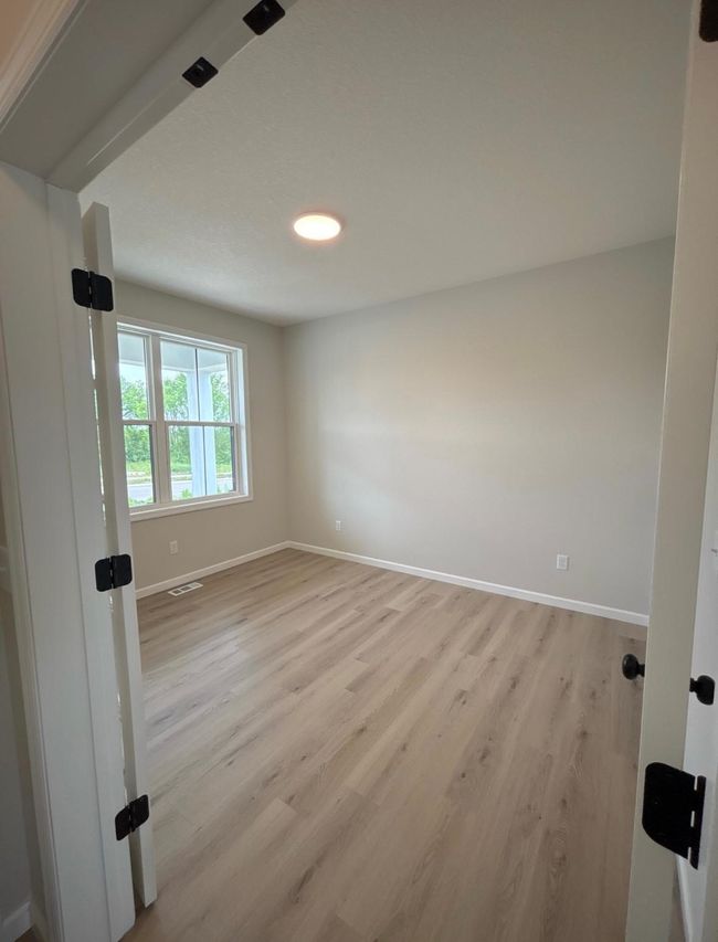 Front Flex Room or Office; Plus back main floor bedroom near main floor full bathroom, perfect for guests (or a 2nd office). | Image 4