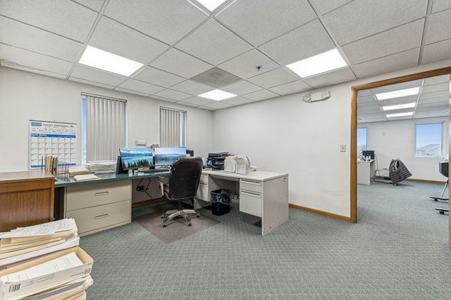 Additional office space located upstairs. | Image 15