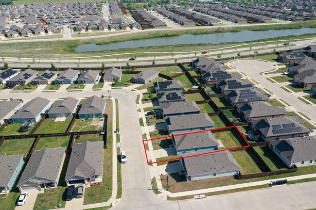 Birds eye view of property featuring a water view and a residential view | Image 24