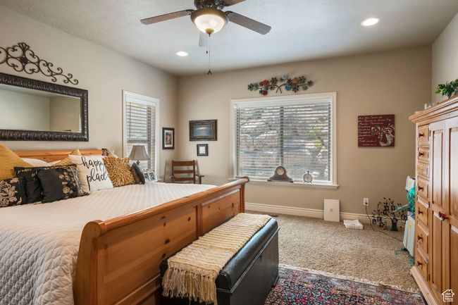 Carpeted bedroom with recessed lighting and a ceiling fan | Image 14
