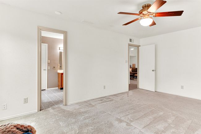 Primary Bedroom featuring ceiling fan | Image 20