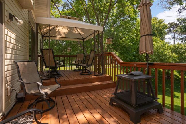 Deck off the back of the home with beautiful pond view. | Image 8