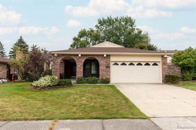 45281 Indian Creek Drive, Home with 3 bedrooms, 2 bathrooms and null parking in Canton Twp MI | Image 1