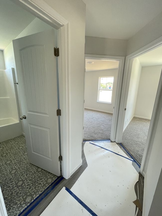 Two downstairs secondary bedrooms with full bathroom | Image 12
