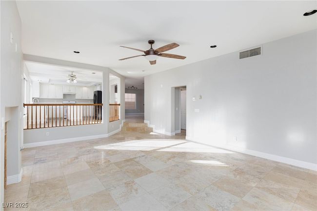 Empty room featuring visible vents, baseboards, and ceiling fan | Image 10