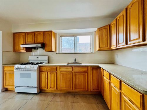 86 57th Ave, Elmhurst, NY, 11373-4838 | Card Image