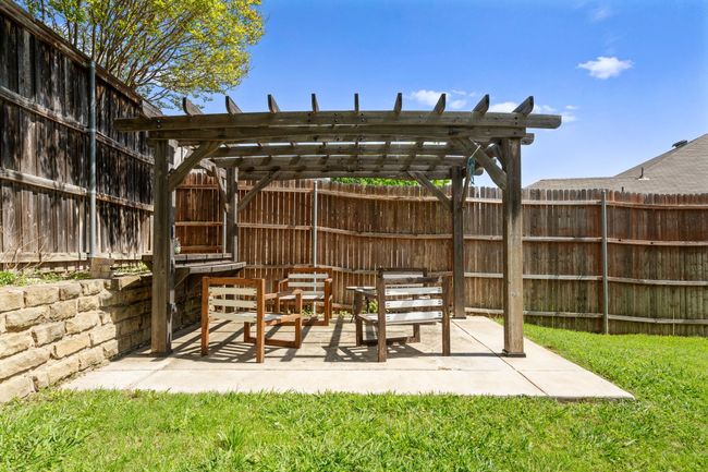 View of patio / terrace with a pergola and fence | Image 30